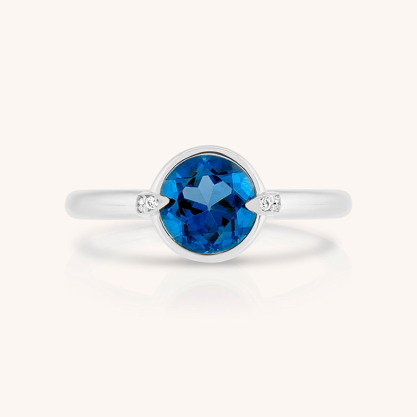 Natural Blue Topaz and Claw Lab Grown Diamond Ring