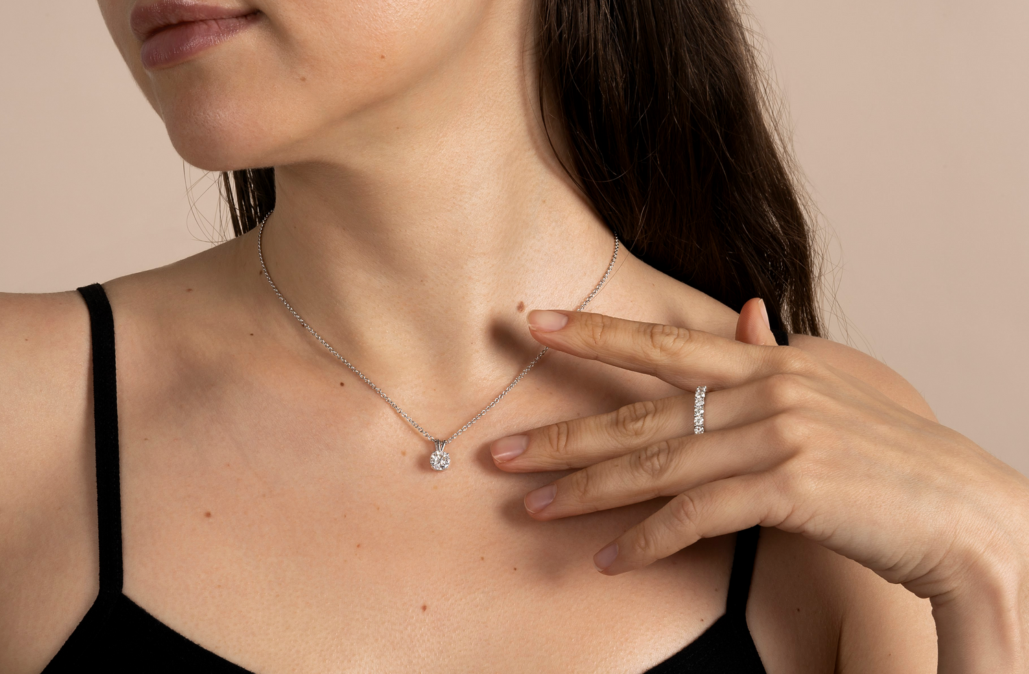 Delicate pendant with a round-cut lab-created diamond, styled for confidence and elegance.