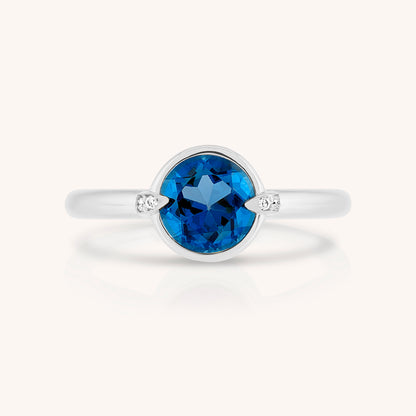 Natural Blue Topaz and Claw Lab Grown Diamond Ring