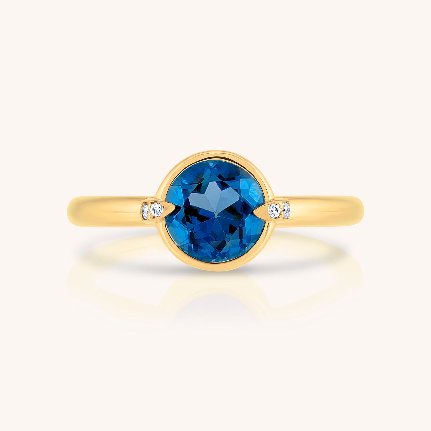 Natural Blue Topaz and Claw Lab Grown Diamond Ring