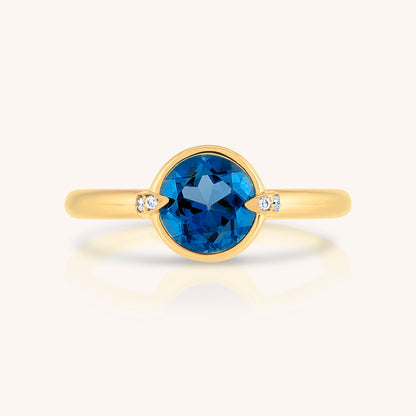 Natural Blue Topaz and Claw Lab Grown Diamond Ring