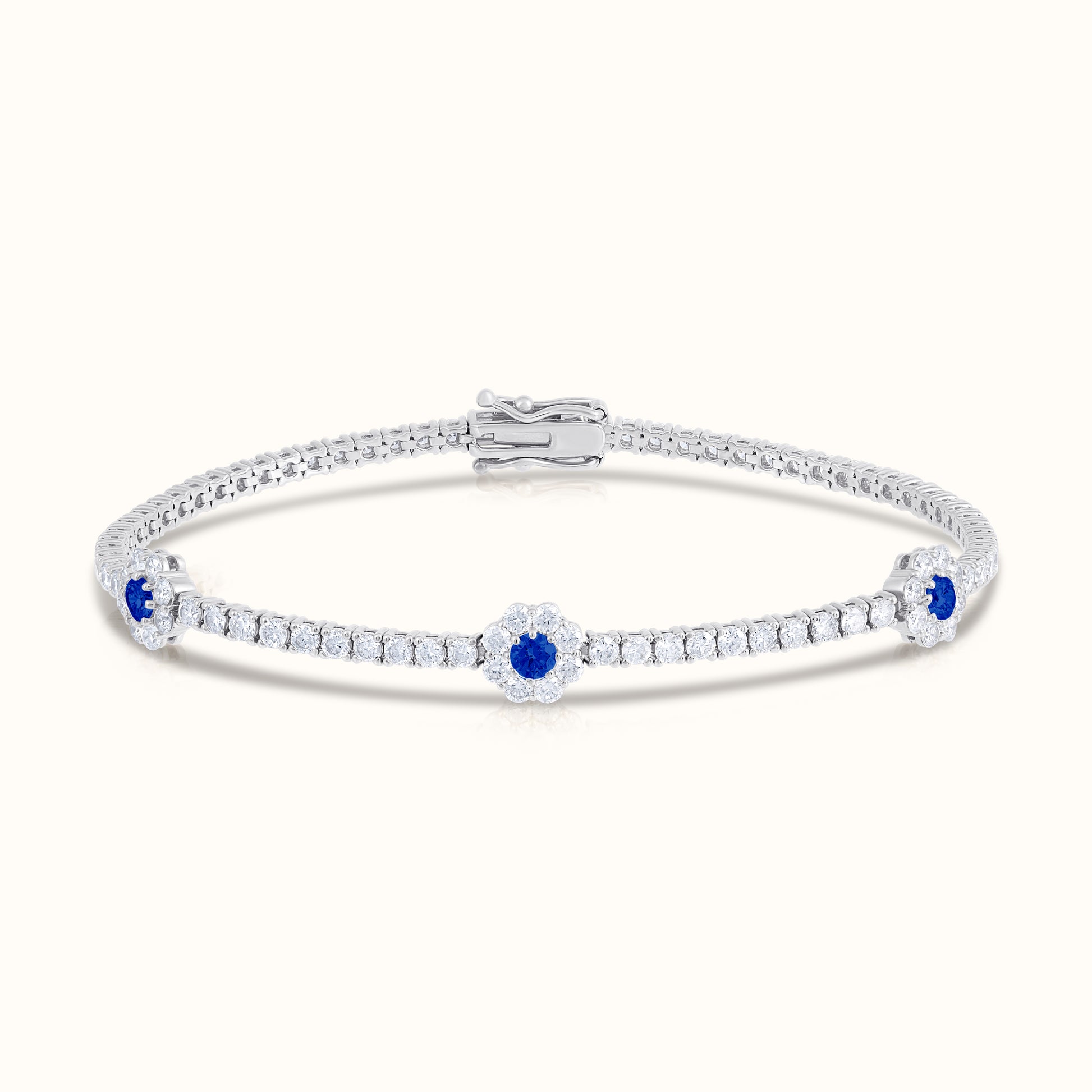 Natural Diamond Tennis Bracelet with Sapphire Centered Flower Clusters - AVIR New York